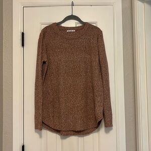 Pink Clover brand in size large. Pinkish in color